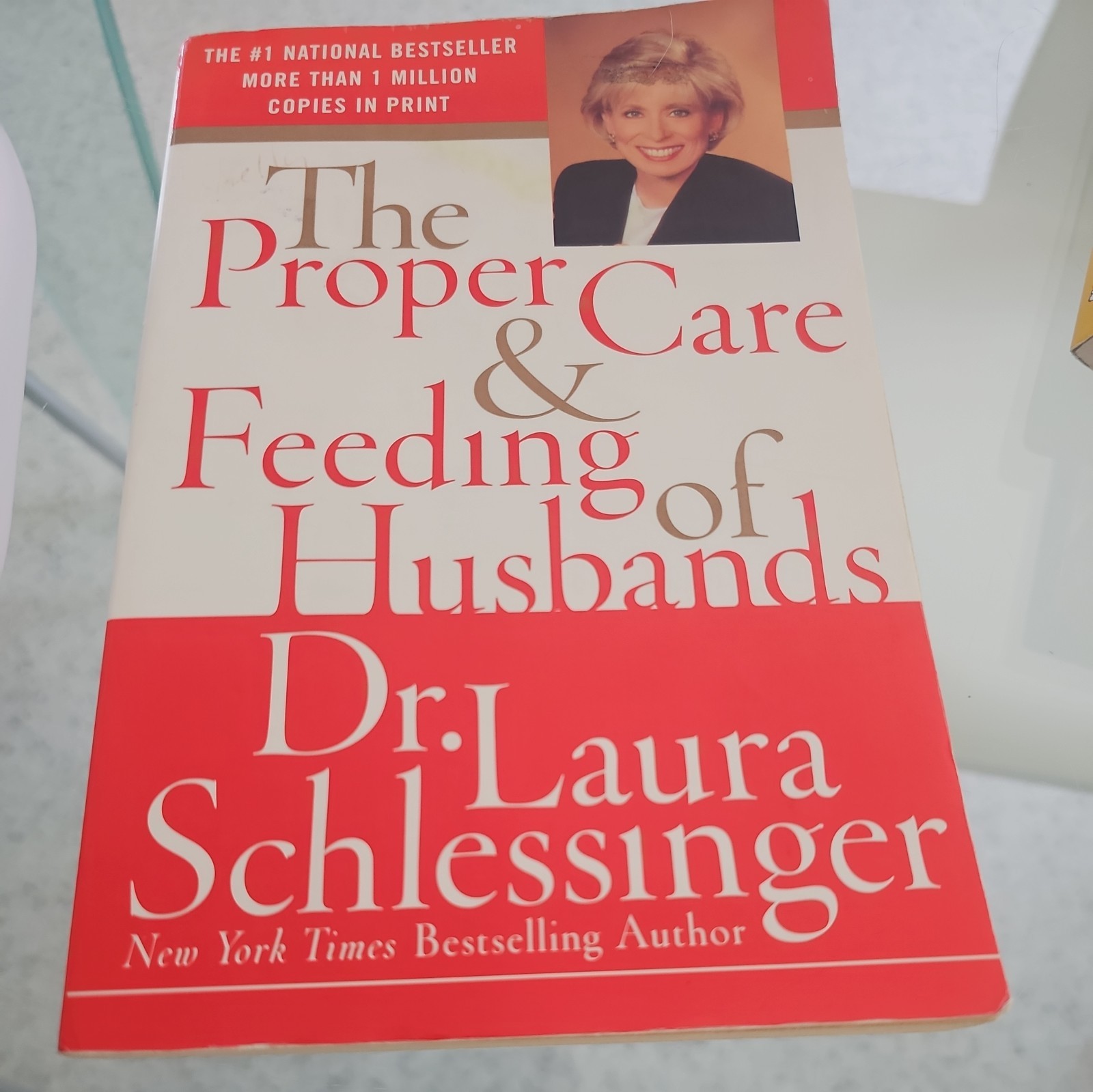 The Proper Care and Feeding of Husbands by Schlessinger Laura C.