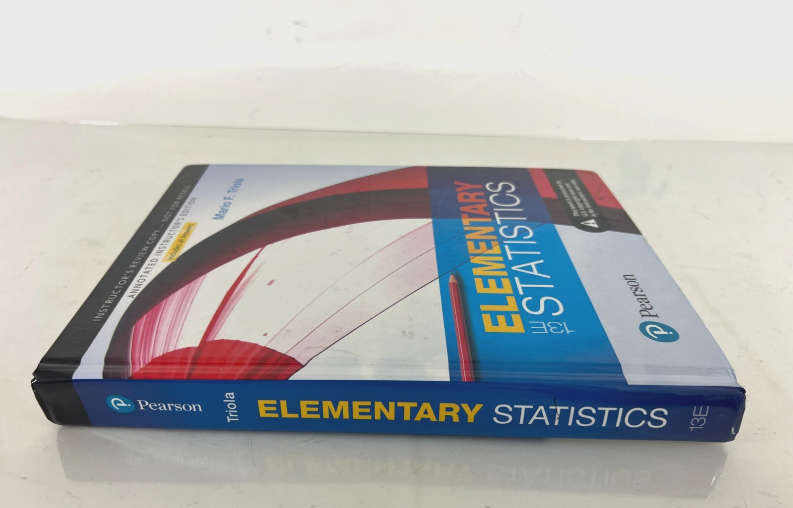 Elementary Statistics Hardcover by Triola Mario | Instructor’s Review Edition